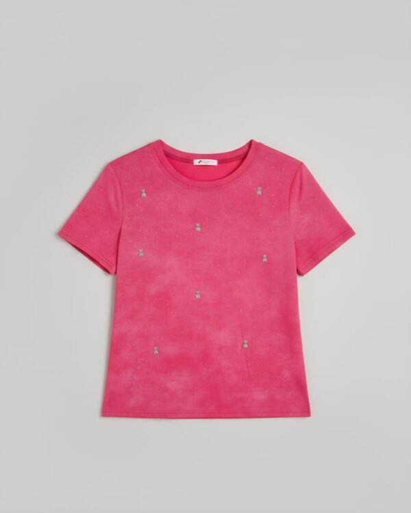 Camiseta de algodón con estampado para niño de LC Waikiki en color fucsia.