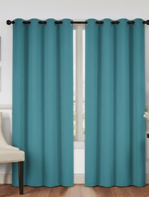 Cortinas (1panel) opacas de color verde azulado con ojales.