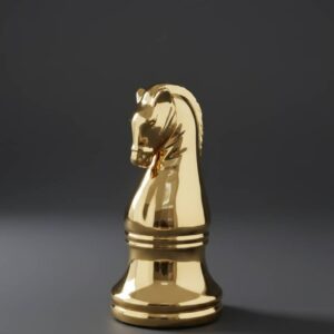 Decoración con forma de caballo de ajedrez dorado