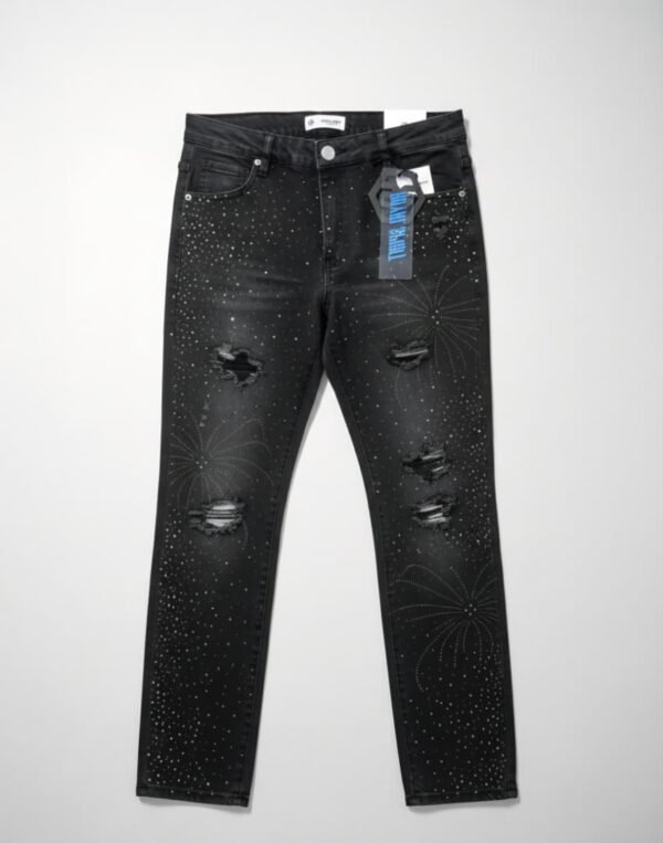 Pantalones vaqueros negros de mujer con diseño desgastado y detalles brillantes