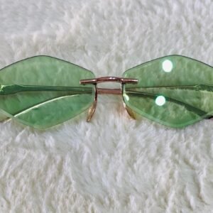 Gafas de sol modelo Mask P60 GG BL con diseño sin montura y lentes verdes.