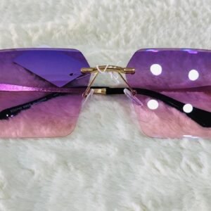 Gafas de sol de moda con diseño sin montura y lentes degradados de color púrpura a rosa