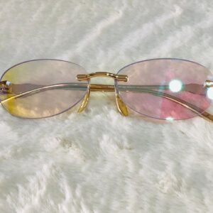 Gafas de sol de metal sin montura tipo vintage