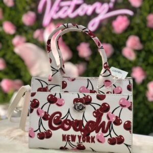 Bolsa Coach Cargo Tote 20 en estampado de cerezas.