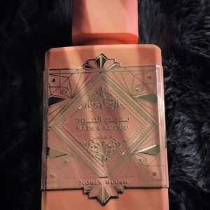Perfume unisex Lattafa Bade'e Al Oud Noble Blush Eau de Parfum, mezcla de notas de leche de rosa, merengue, almendra, vainilla, almizcle y sándalo.