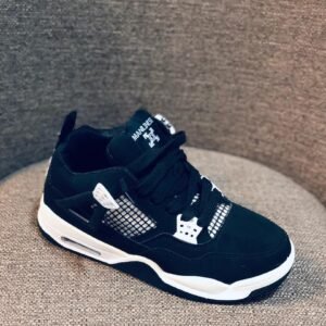 Zapatillas deportivas negras y blancas para niños