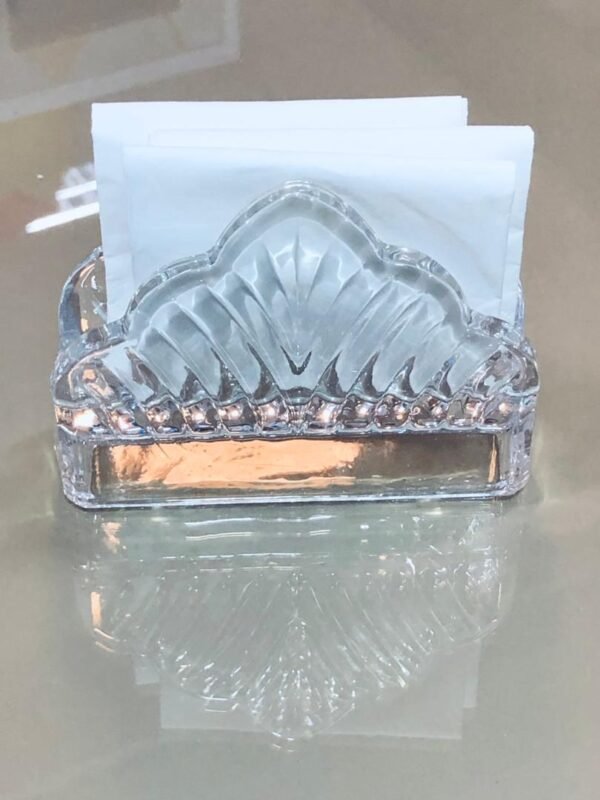 Servilletero de cristal con diseño triangular y detalles tallados