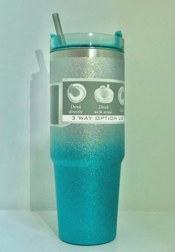 Vaso térmico tipo "tumbler" de acero inoxidable con purpurina azul, diseñado con una función "3-way option" para diferentes métodos de consumo.