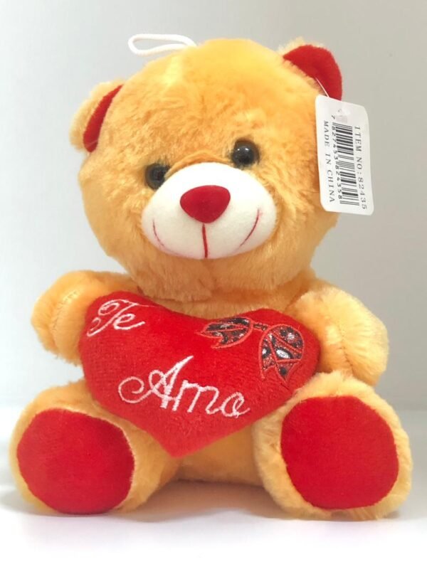 Oso de peluche amarillo con corazon y letrero "Te Amo"