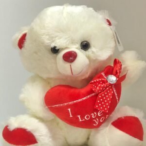 Oso de peluche blanco con corazon y letrero "I Love You"