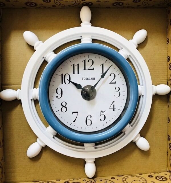 Reloj de pared con diseño de timón de barco