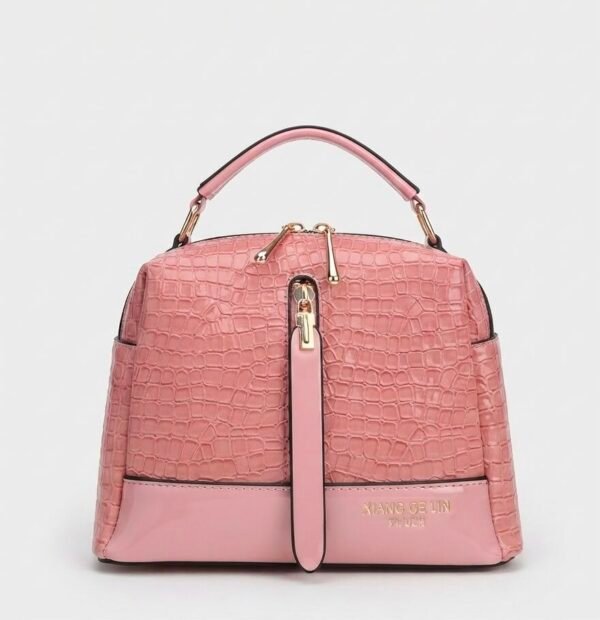 Bolso de mano con textura de cocodrilo rosa