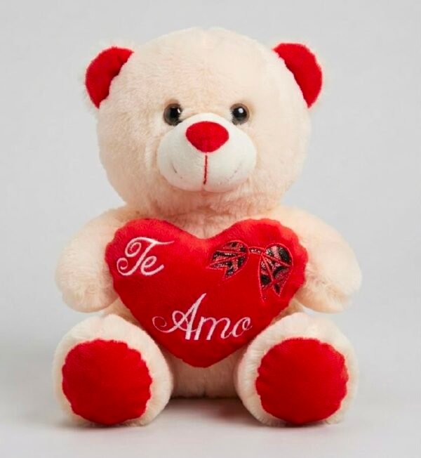 Oso de peluche blanco con corazón rojo