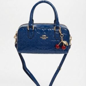 Bolso de mano Coach azul marino con patrón monograma
